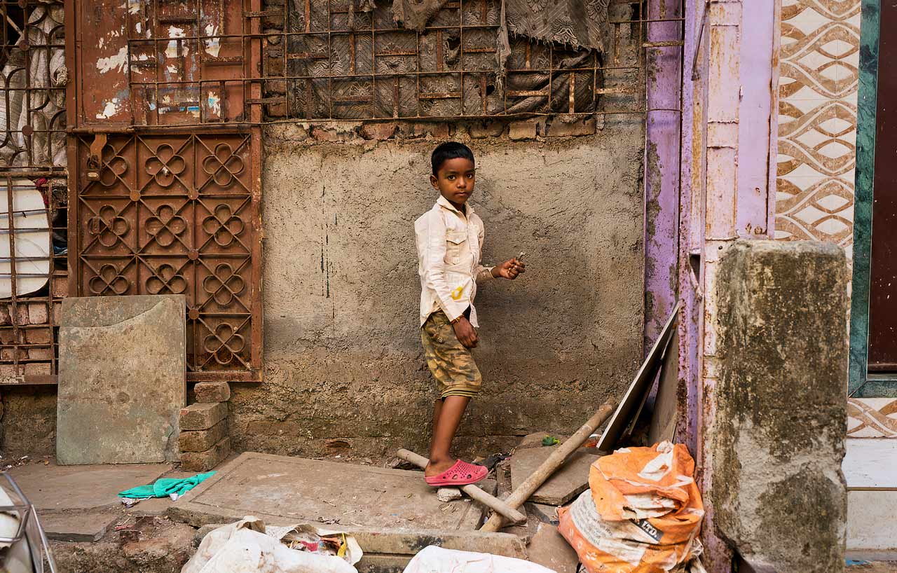 Mumbai, Malvani, child playing on street